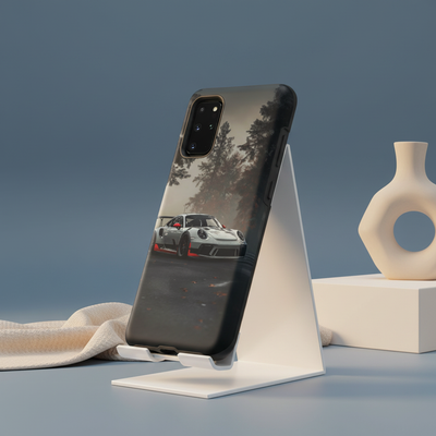 Aero Fog phone case on a minimalist display stand with a slate blue background and warm cream accents.